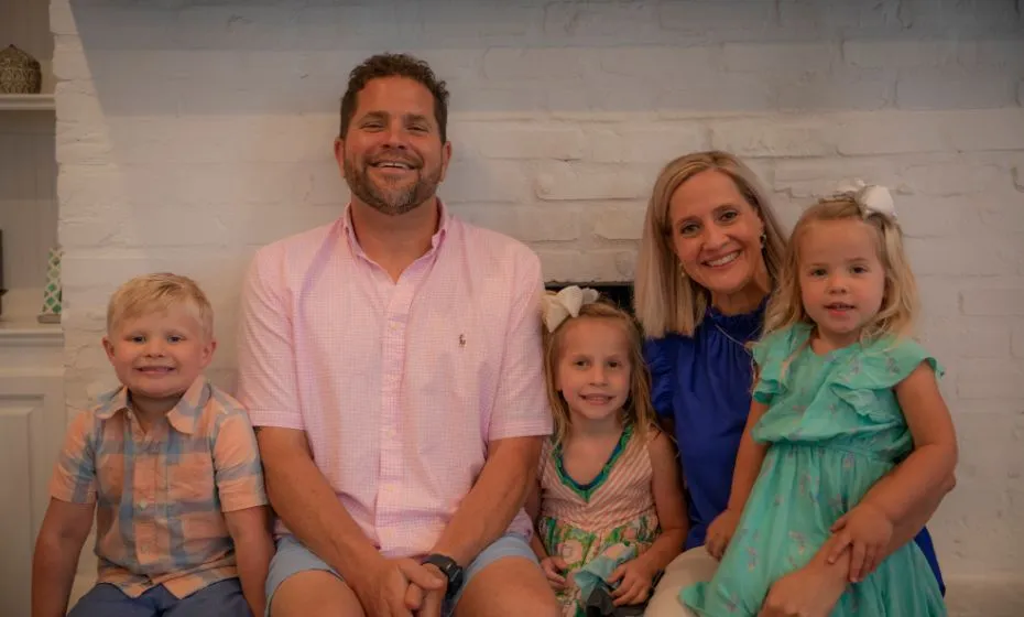 A portrait of Impella patient Kris Kirkman and his family