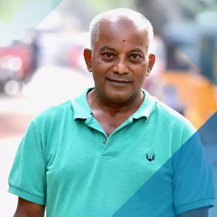 Image of Impella patient on navy background with a hash pattern overlayImage of Impella® patient Andrea with her husband on a teal background with a hash pattern overlay